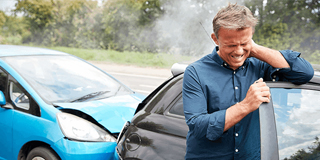 man injured in car accident who needs chiropratic care for whiplash