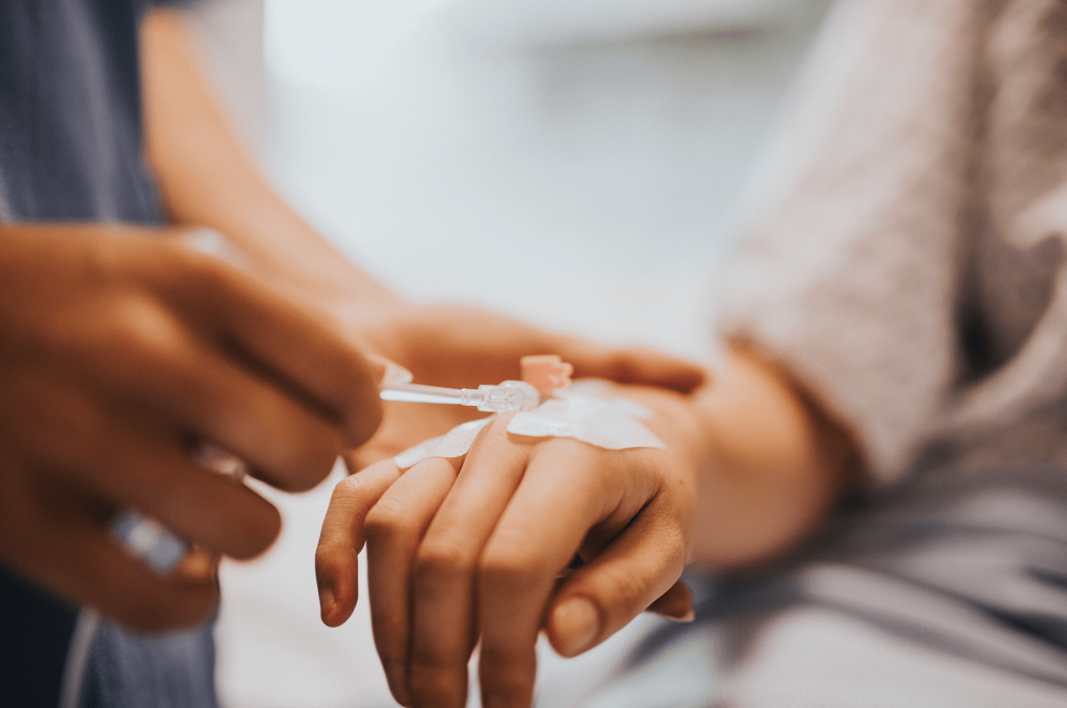 Patient receiving IV therapy injection for hydration and wellness in Oklahoma City clinic